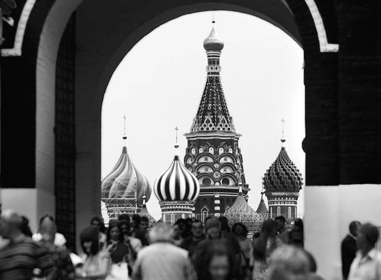 Crowded Red Square with the St. Basil Cathedral in the background in Moscow, Russia